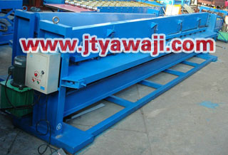 Shearing machine and bending machine